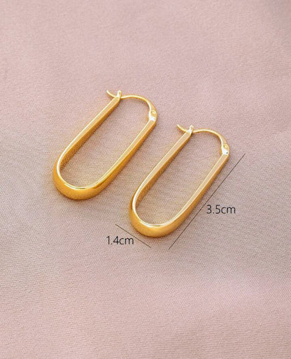 boucles d'oreilles créoles en forme de trombone par noevamitch